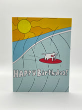 Load image into Gallery viewer, Hand-drawn dog surfing a red board on a turquoise wave with Happy Birthday wording, Hawaii birthday card