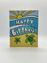 Load image into Gallery viewer, Hand-drawn green honu sea turtles under sunrays with a Happy Birthday banner, Hawaiian birthday card